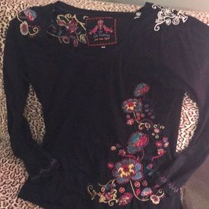 Long sleeve black shirt with embroidered design